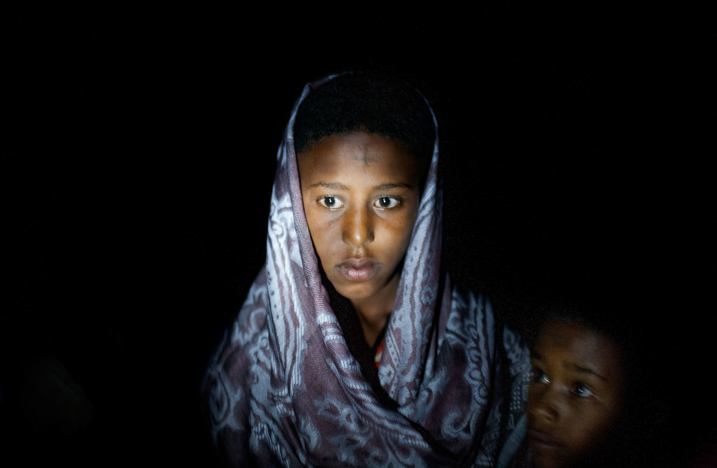 Destaye, 11, is dressed in traditional Ethiopian Orthodox wedding attire for her marriage to Addisu, 23, a priest.